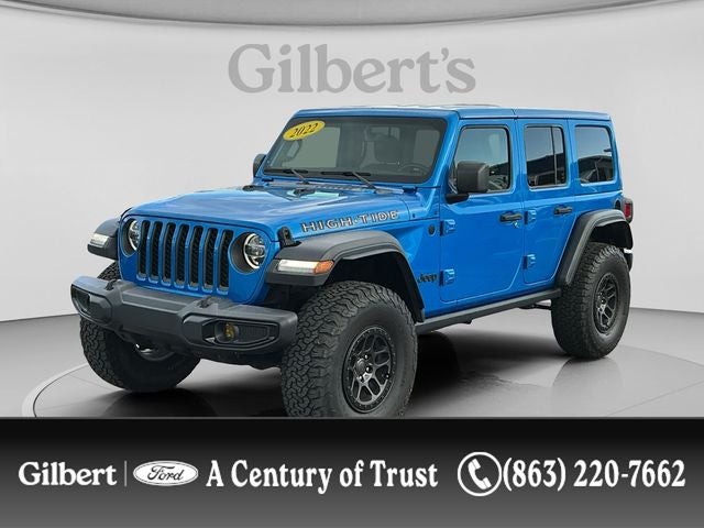 2022 Jeep Wrangler Unlimited High Tide in Hydro Blue Pearl Coat — front three-quarter view