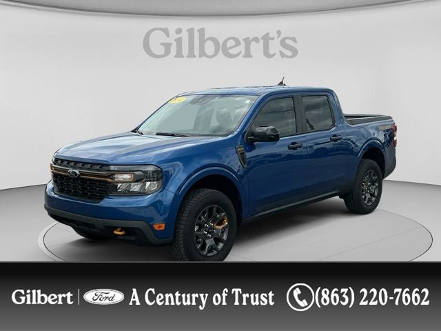 2024 Ford Maverick XLT Advanced in Blue Metallic — front three-quarter view