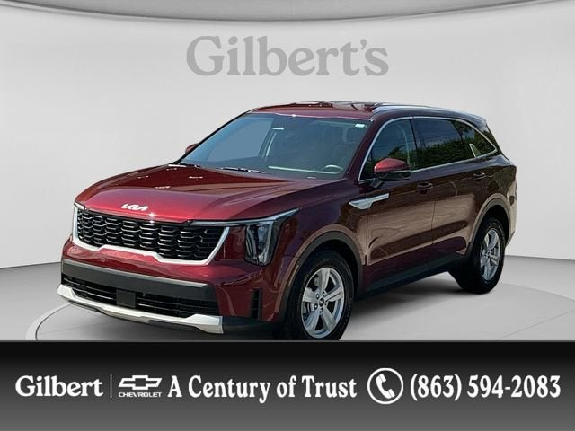 2025 Kia Sorento LX in Red — front three-quarter view